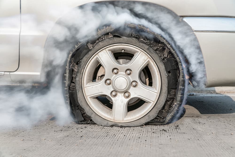 Burst tire on road