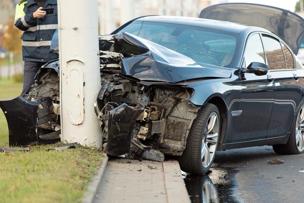 car crashes into utility pole