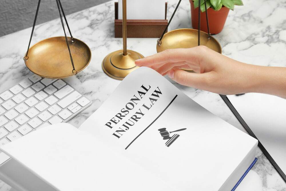 Lawyer reviewing personal injury law papers