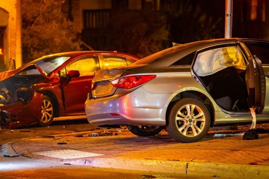 Two cars parked after having collided