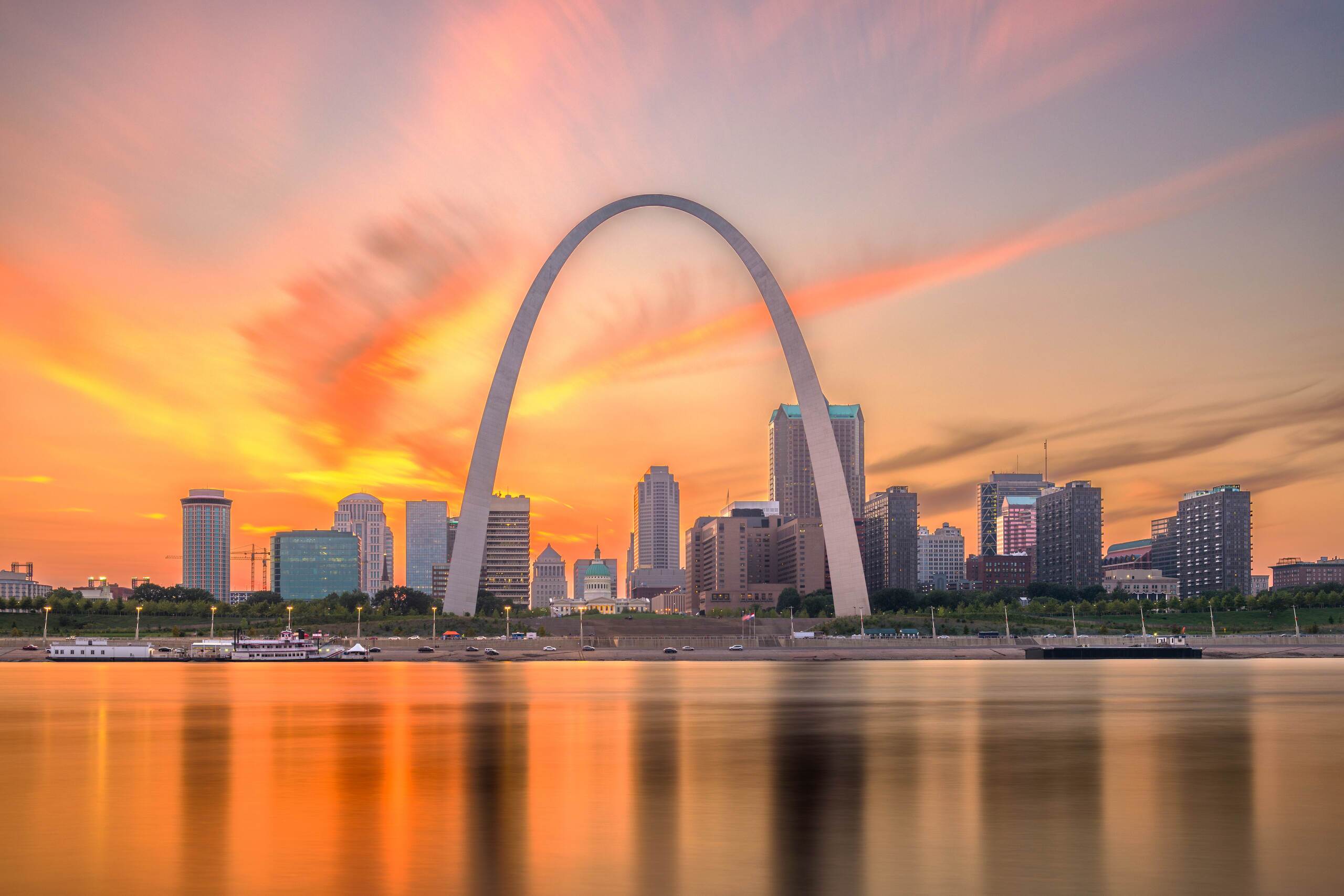 St. Louis Gateway Arch skyline at sunset represented by St. Louis Distracted Driving Accident Lawyers.